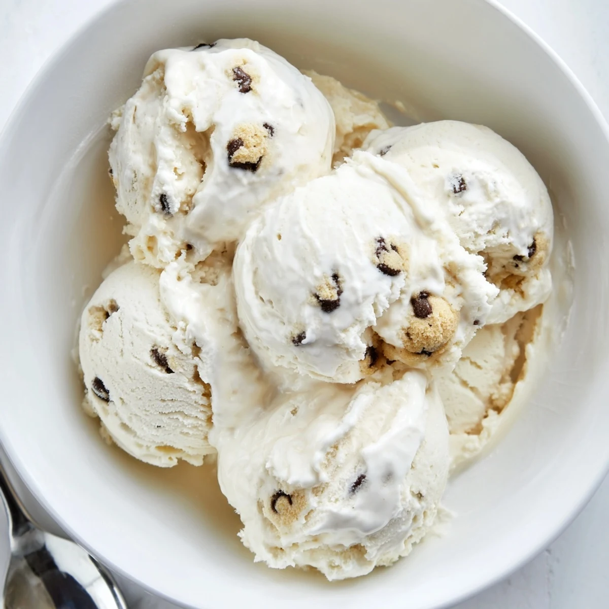 Creamy cottage cheese ice cream with cookie dough, perfect for summer treats.  