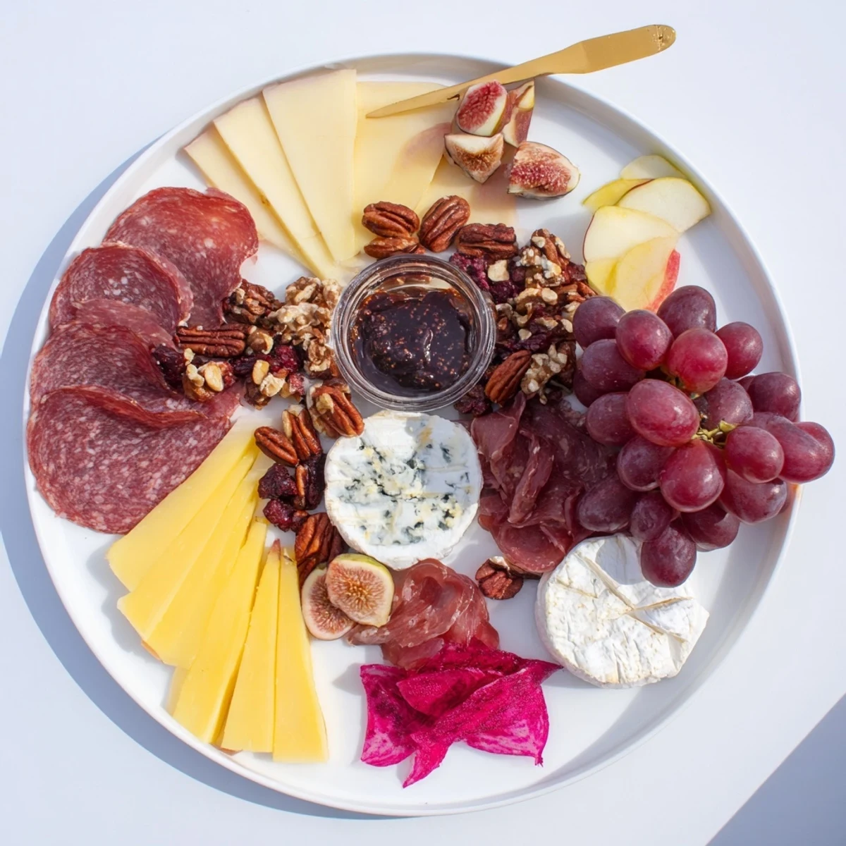 Elegant Majestic Venison Charcuterie Platter with cured meats, gourmet cheeses, fruits, and nuts served beautifully.