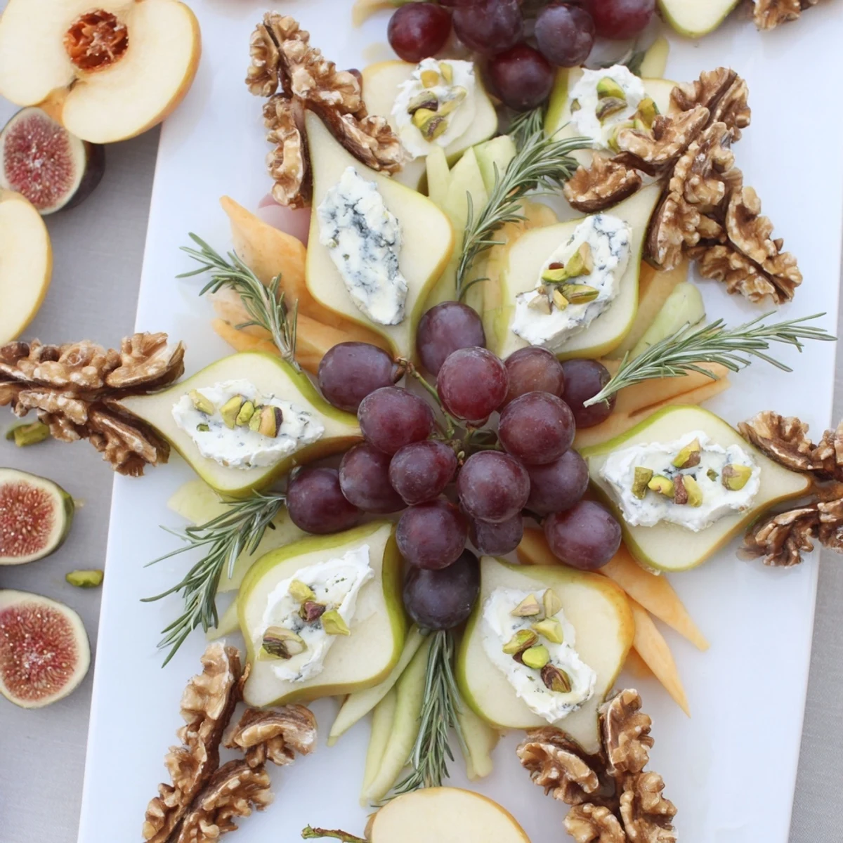 Vibrant Fig and Walnut Star Board with sweet figs, creamy vegan cheese, and crisp crackers, perfect for sharing.
