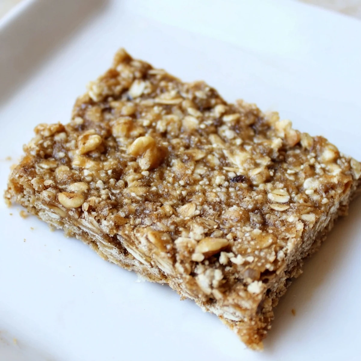 Golden-brown Maple Cinnamon Oatmeal Bars, perfect for a grab-and-go breakfast treat to enjoy.
