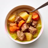 Classic Beef & Veggie Stew recipe: Thick, savory broth with tender meat and vegetables.
