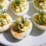 Tangy Dill Pickle Deviled Eggs: a close-up photo of the classic party appetizer, ready to serve.