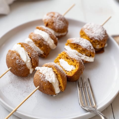 Savory Cream Cheese Sweet Potato Muffin Skewers with a dusting of cinnamon.  