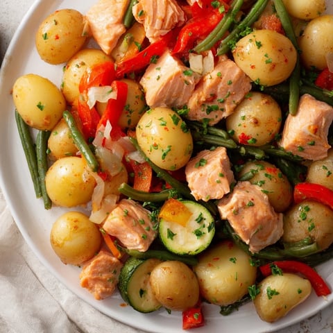 Golden brown Salmon & Potato Skillet with flaky salmon, tender potatoes, and vibrant vegetables.