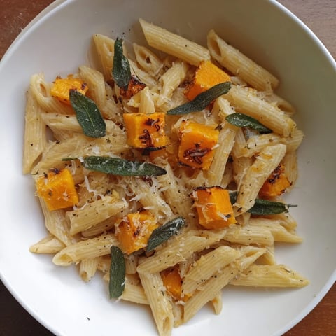 A close-up shot of rich brown butter pasta with butternut squash, perfect for fall.