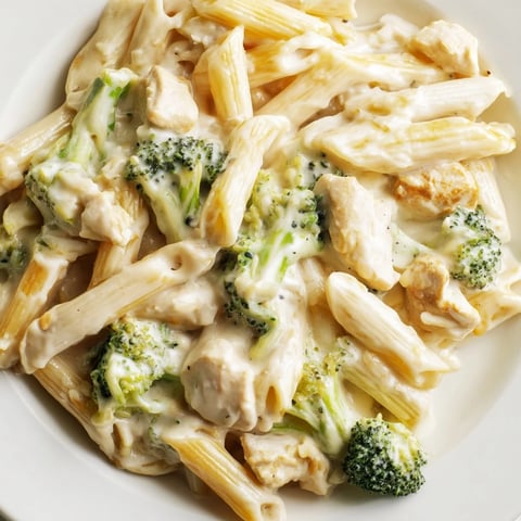 Creamy Chicken Broccoli Cheddar Pasta with tender chunks of chicken and bright green broccoli florets in a rich cheddar sauce.
