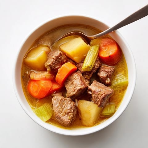 Classic Beef &amp; Veggie Stew recipe: Thick, savory broth with tender meat and vegetables.