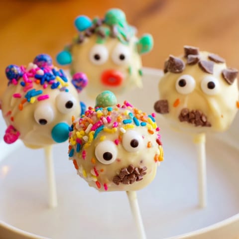 Deliciously sweet and playful cake pops, coated in cinnamon sugar for festive fun.  