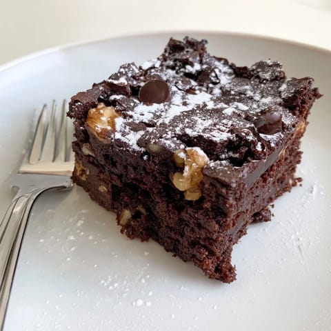 Fudgy zero-waste brownies made with nut-milk pulp, perfect for dessert lovers.  