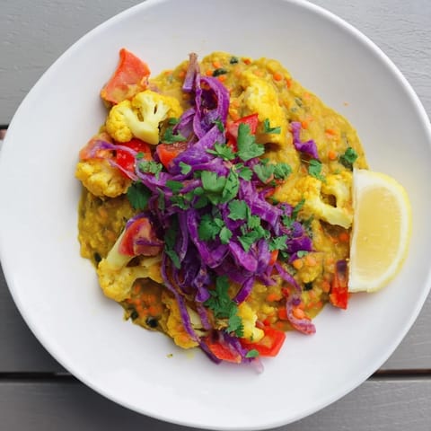 Warm and creamy Red Cabbage, Cauliflower & Coconut Dhal, a cozy Indian-inspired vegetarian dinner.