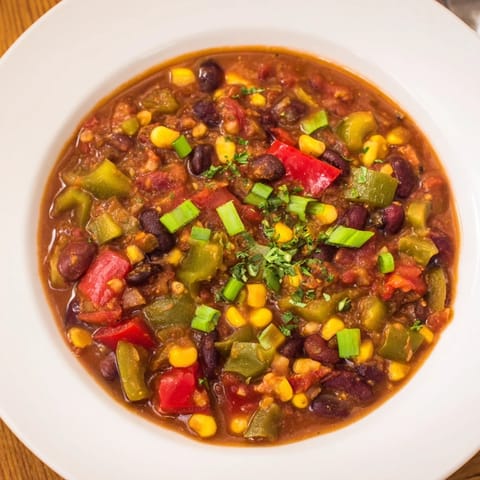 Rich and savory veggie chili offers a hearty, comforting, and spicy vegetarian dinner option.