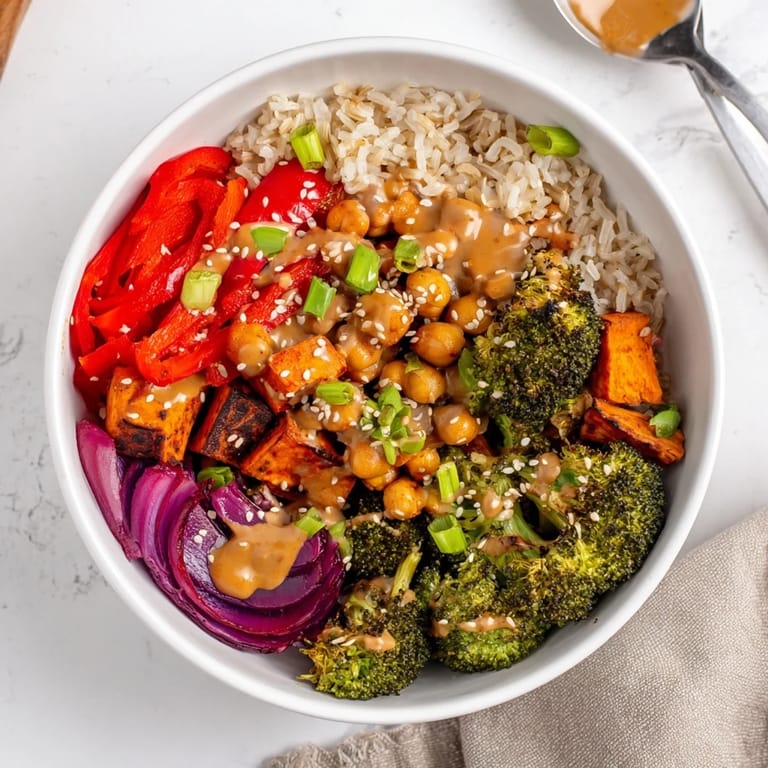 Colorful grain bowls featuring miso-butter and gochujang-maple sauces enticingly drizzled.