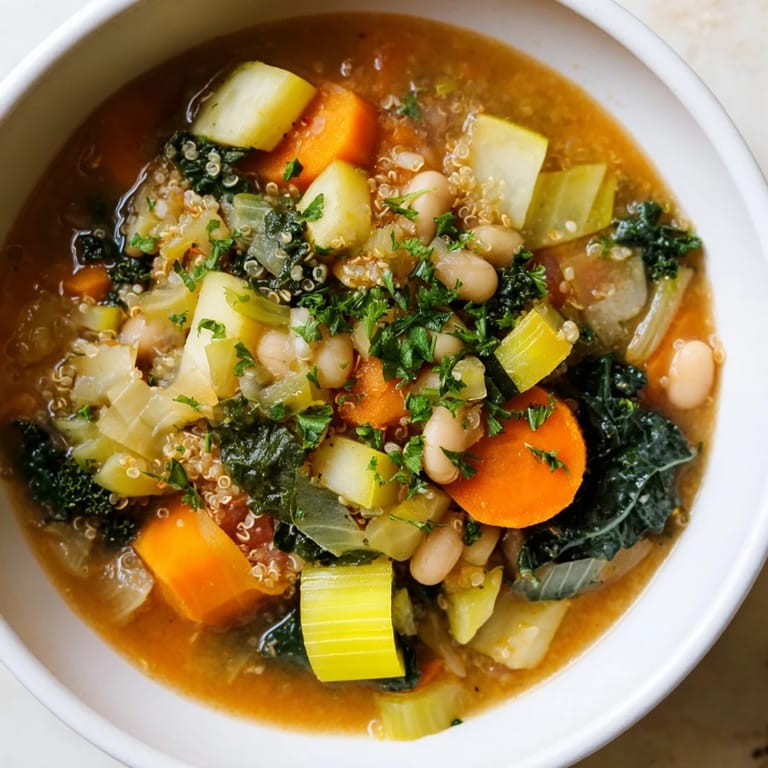 Delicious, homemade Minestrone with Quinoa & Winter Greens, perfect for a cozy, healthy vegetarian meal.