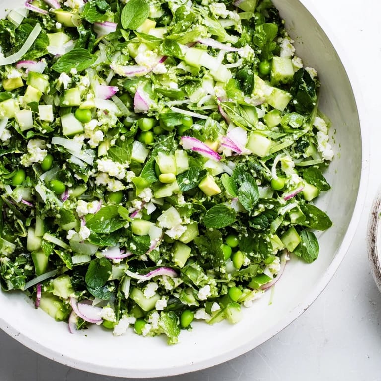 This vibrant Green Goddess Cabbage Dip features a creamy, herbaceous dressing, perfect for scooping with chips.