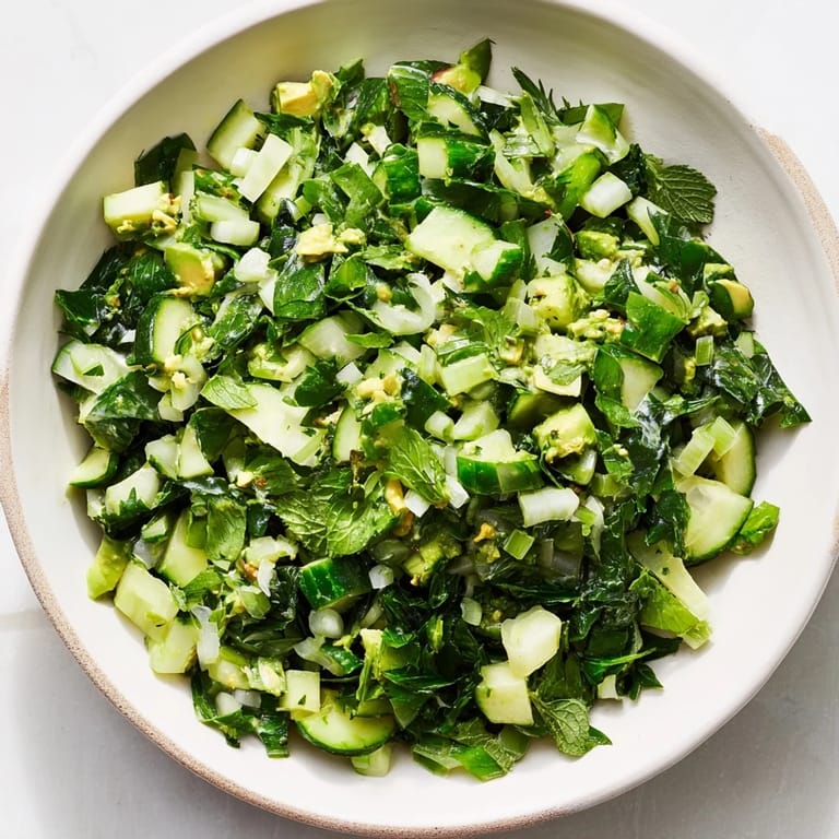Enjoy the delicious crunch: a bowl of Green Goddess Cabbage Dip, ready to be served with colorful crudités.