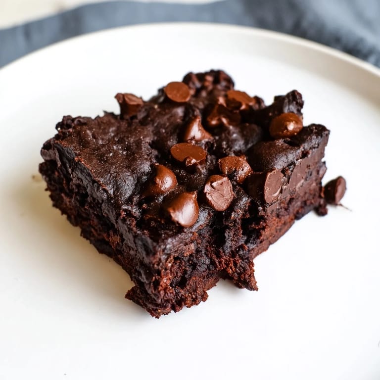 A close-up of dark and delicious Greek yogurt brownies, offering a healthier chocolate indulgence.
