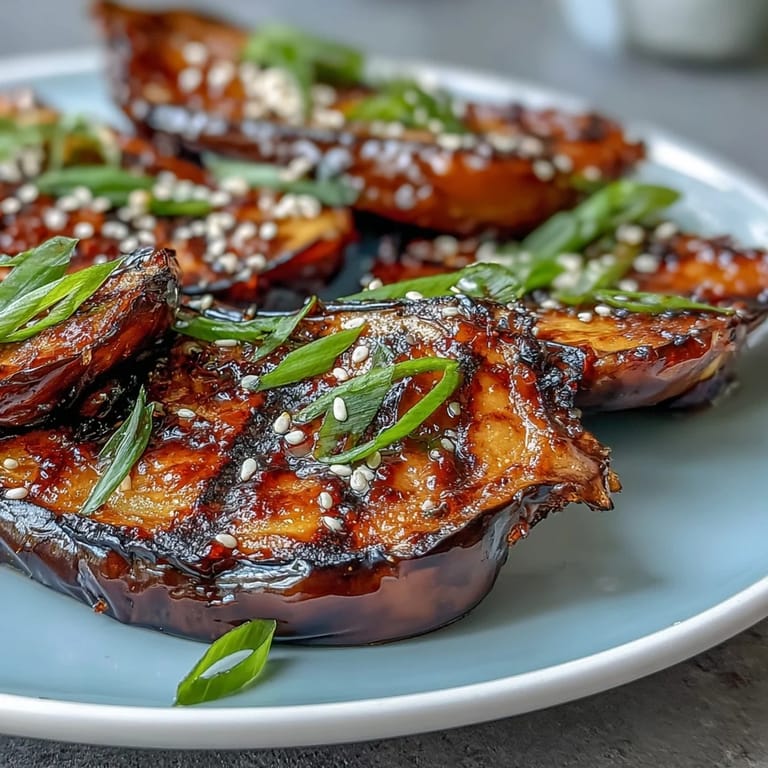 Savory Miso Glazed Eggplant, a vegetarian dish showcasing sweet, sticky, umami-rich glaze.