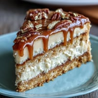 A stunning layered vanilla cake with floral buttercream, perfect for celebrating a Taurus birthday and graduation in style.